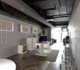 modern interior, white walls, wooden floor, white furniture, gray carpet, metal racks, gray ceiling, black pipes