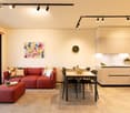 open space with living area, dining table and kitchen