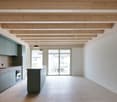 kitchen, island, large windows, exposed wooden beams