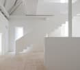 wooden floor, white walls, white ceiling, white staircase, white partition wall