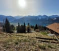 property with a beautiful view of the mountains and a lake