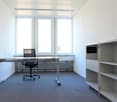 empty room, desk, chair, windows, shelves