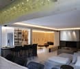 modern furniture, wooden cabinets, island kitchen, bar stools, fireplace, living room sofa, dining table