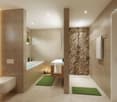 modern bathroom with bathtub, shower, sink, toilet, towels, rugs, wall-mounted plants