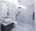 modern bathroom with gray tiles, white sink, black faucet, white toilet, glass shower enclosure, mirror, and towel rack