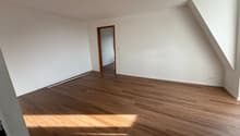 empty room, wooden floor, white walls, wooden door, sunny