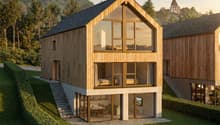 modern wooden house, raised ground floor, large windows, green surroundings, mountain view