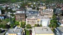 Place de parc à Sierre - Vue drone / Parkplätze in Sierre - Drohnenaufnahme / Parking Spaces in Sierre - Drone View