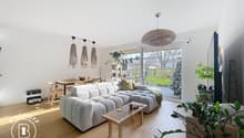 Gray sofa, wooden coffee table, TV, dining table and chairs, potted plants, floor lamps
