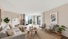 ample living room with sofa, chairs, coffee table, plants, fireplace, glass windows with curtains, balcony, carpet, lamp