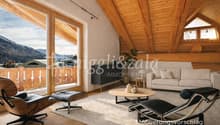 wooden ceiling, large windows, balcony, couch, coffee table, armchairs, rug