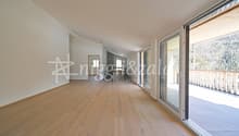 empty room, wooden floor, white walls, large glass doors, balcony