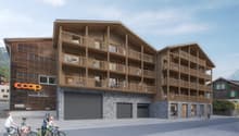 Modern wooden building with multiple floors, balconies, and garages