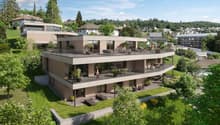 Modern multi-story house with multiple balconies, surrounded by greenery and trees