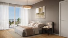 Large bedroom with bed, nightstands, lamps, and decorative rug, gray walls, sliding windows, balcony with railing, white curtains