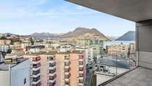 balcony with city and lake view, railings