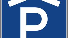 Blue sign with a white house and the letter 'P' indicating a parking area.
