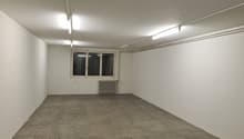 empty room, white walls, white ceiling, radiator, window, grey floor