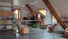 Bookshelves, desk, office chair, whiteboard, radiator, windows