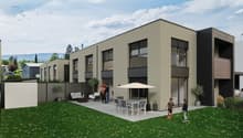Modern two-story house with a terrace, large windows, and a well-maintained garden