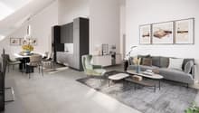 Open plan living, dining, and kitchen area with modern furnishings, large windows, vaulted ceilings, and artwork.