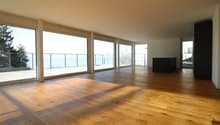 large windows, wooden floor, empty room, balcony, sea view