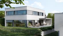 Modern white house, large glass windows, outdoor terrace, garden, patio furniture