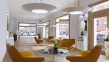 modern design, large windows, wooden floors, yellow chairs, round table, plants, lamp, minimalistic style