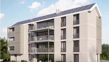 modern apartment building, solar panels on the roof, balconies on each floor, white exterior, large windows