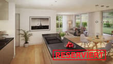 kitchen and living area with table and chairs, large windows, picture frame, potted plants, coffee machine, modern appliances