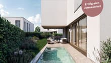 Modern house with a swimming pool in the garden, white exterior, large glass windows, outdoor seating area