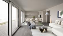 large living room with grey flooring, white walls, grey armchair, white couches, large glass doors, open-plan kitchen, dining table, large windows, floor-to-ceiling