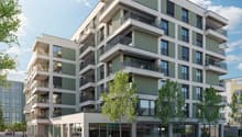 High-rise building, 7 floors, multiple balconies, green facades, modern design, large windows, commercial spaces at the ground level
