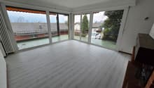 large windows, terrace, white laminate floor, fireplace, outside view