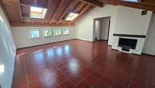 empty room, fireplace, wooden ceiling, brown tiles, windows