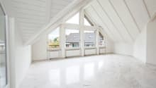 empty room, white walls, white floor, large windows, balcony outside, radiators