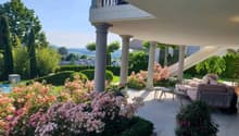 covered terrace with columns, flowers, swimming pool, garden, view of the mountains