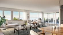modern living room, large windows, white furniture, wooden table, rug, plants, view of the sea