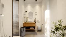 Bathroom with large bathtub, wooden vanity, toilet, mirror, modern lighting, and plant