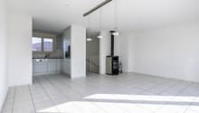 empty room, white tiles, white walls, kitchen area, fireplace, hanging lamps