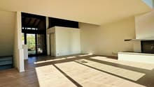 modern interior, wooden floor, white walls, glass door, fireplace