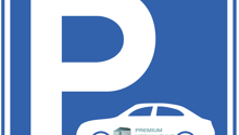 Blue sign with white letter P and car icon, text reads 'Premium Verwaltung'