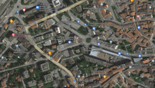 Aerial view of a city area with various landmarks, businesses, and establishments.