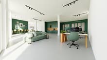 green walls, large green sofa, round table with office chair, dining room table and chairs, kitchen area with coffee machine