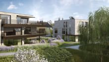 Modern architectural design, two-story building, brick and glass facade, multiple balconies, landscaped garden, pathway, trees, and shrubs