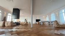 modern living room, hardwood floors, large windows, modern furniture, central column, suspended lights