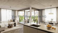 Offene Wohnküche mit direktem Terrassenzugang und Betondecke