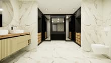 modern bathroom with white marble walls, wooden drawers, double sinks, mirror, toilet