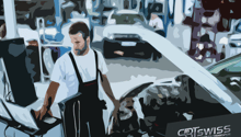 mechanic working in a car repair shop, diagnostic tools, car open for repair