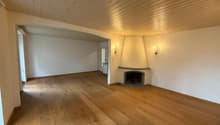 empty room, wooden floor, white walls, fireplace, wall lamps